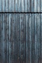 Old rustic pine wood wall painted in black as background