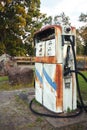 Old rustic pump at an abandoned fuel station Royalty Free Stock Photo