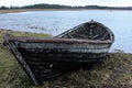 Old rustic rowboat next to a lake Royalty Free Stock Photo