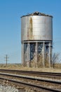 Old rustic water tower along a railroad Royalty Free Stock Photo
