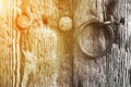 Old rustic wooden door with a ring handle Royalty Free Stock Photo