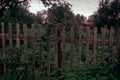 Old rustic wooden fence in the Siberian village