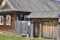 Old rustic wooden house of the 19th or 20th century. The house is made of a log house, a natural building material. Royalty Free Stock Photo