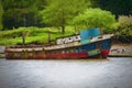 Old rusting boat sits tied at dock Royalty Free Stock Photo