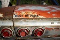 Old rusting Chevrolet with text - Rust in Peace