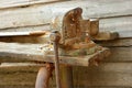 Old rustu all-steel vice on obsolete wooden Royalty Free Stock Photo