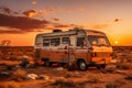 old rusty abandoned bus stands in the desert. Beautiful view of red sunset