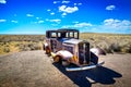Old rusty and abandoned car in the Arizona desert USA Royalty Free Stock Photo