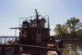 Old rusty abandoned tugboat stranded, Romania, Severin Royalty Free Stock Photo