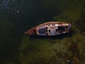 old rusty abandoned yacht on the seashore Royalty Free Stock Photo