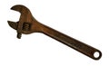 old rusty adjustable wrenchlie on a white background Royalty Free Stock Photo