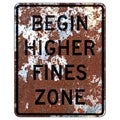 Old rusty American road sign - Begin higher fines zone