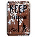 Old rusty American road sign - Bicycles left pedestrians right Royalty Free Stock Photo