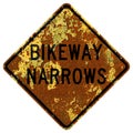 Old rusty American road sign - Bikeway narrows Royalty Free Stock Photo