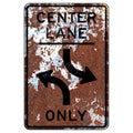 Old rusty American road sign - Concurrent Center Left Turn Lane Royalty Free Stock Photo