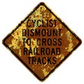 Old rusty American road sign - Cyclists Dismount To Cross Railroad Tracks, Hemet, California