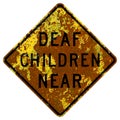 Old rusty American road sign - Deaf children near, California