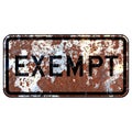 Old rusty American road sign - This railroad stop is exempt from the horn blowing