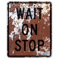 Old rusty American road sign - Wait On Stop Royalty Free Stock Photo