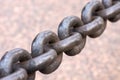 Old rusty anchor chain. The chain links are out of focus Royalty Free Stock Photo