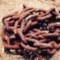 Old rusty anchor chain. Macro. Selective focus. Royalty Free Stock Photo