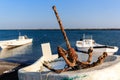 Old rusty anchor on fishing boat