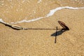 Old rusty anchor in the sand Royalty Free Stock Photo