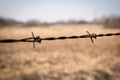 Old, rusty barbed wire. Boundary, barrier and prohibition Royalty Free Stock Photo