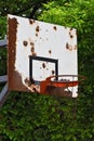 Old and rusty basketball board in schoolyard - rusty chain - slam dunk nba