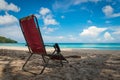 Old and Rusty Beach Chair on Beach at Sunny Day