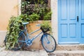 Old rusty bike leaning against a wall. Vintage retro bicycle.