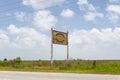 An old and rusty billboard along a roud near Lake Charles Royalty Free Stock Photo