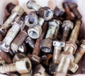 Old rusty bolts, abstract industrial background and texture Royalty Free Stock Photo