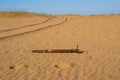 Old rusty bomb lie in a sandy desert