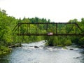 Old rusty bridge with USA flag Royalty Free Stock Photo