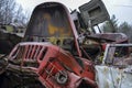 Old rusty broken and damaged abandoned Soviet fire truck on scrap metal recycling yard Royalty Free Stock Photo