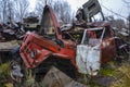 Old rusty broken and damaged abandoned Soviet fire truck on scrap metal recycling yard Royalty Free Stock Photo