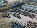 Old rusty broken Russian military cars for scrap metal, aerial view