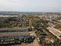 Old rusty broken Russian military cars for scrap metal, aerial view