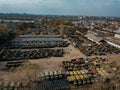 Old rusty broken Russian military cars for scrap metal, aerial view