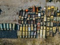 Old rusty broken Russian military cars for scrap metal, top view