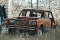 Old rusty Soviet retro car in an abandoned city Royalty Free Stock Photo