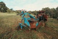 Old and rusty broken vintage rototiller or cultivator