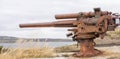 Old rusty cannon from the Falklands War in the Falkland Islands. An impressive monument to history. Royalty Free Stock Photo