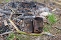 Old rusty cans in a campfire. Place for camping in the forest Royalty Free Stock Photo