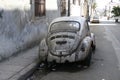 Old rusty car in the back alley in Havana, Cuba Royalty Free Stock Photo