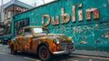Old rusty car near traditional Irish pub on Baggot Street, Dublin city centre Royalty Free Stock Photo