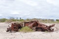 Old rusty car on a sand Royalty Free Stock Photo