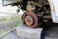Old rusty car wheel. Cracked tires and rusted hubcaps Royalty Free Stock Photo