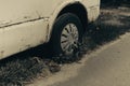 Old rusty car wheel. Cracked tires and rusted hubcaps Royalty Free Stock Photo